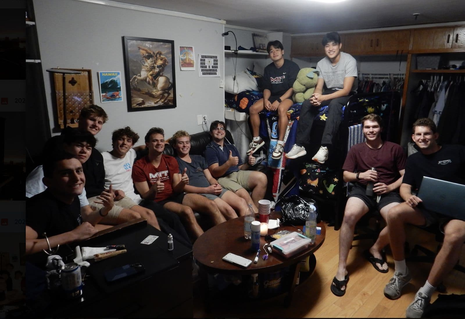 The house hanging out together in a common room at night.